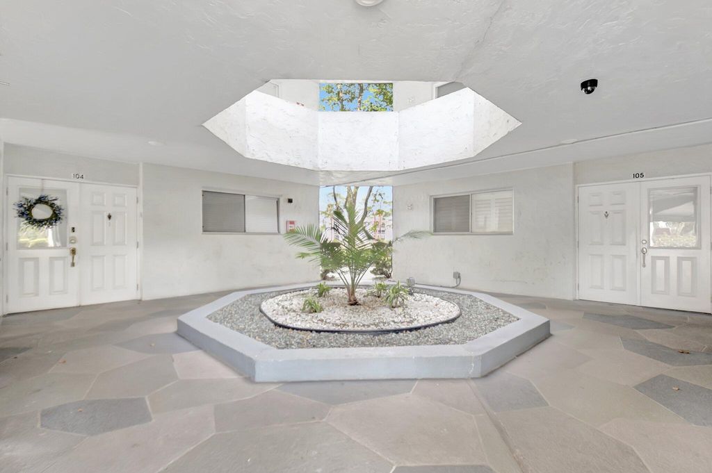 Photo of 3425 Via Poinciana Drive #306, Lake Worth, FL 33467 (MLS # R11081871)