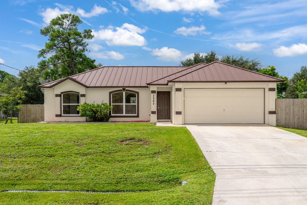 Photo of 2062 SW JANETTE Avenue, Port Saint Lucie, FL 34953 (MLS # B26072071)