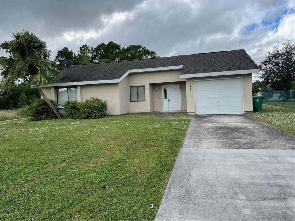 Photo of 462 SW Peach St, Port Saint Lucie, FL 34983 (MLS # F10309205)