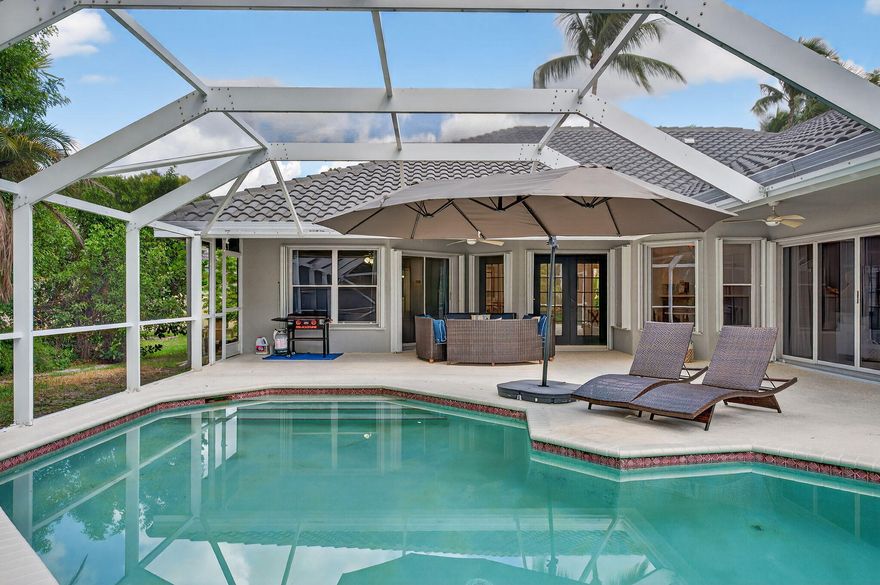 Welcome to The Isles at Mission Bay in West Boca Raton! This spacious  1 story 5BR, 3BA home offers 3,720 sq ft of living space, soaring ceilings, and a bright open layout. Relax in your private screened-in pool surrounded by lush landscaping. Mission Bay residents enjoy resort-style amenities with a low HOA fee! Ideally located near top-rated schools, dining, shopping, and entertainment, with easy access to major highways. Don't miss this opportunity to live in one of Boca's most vibrant, family-friendly communities!