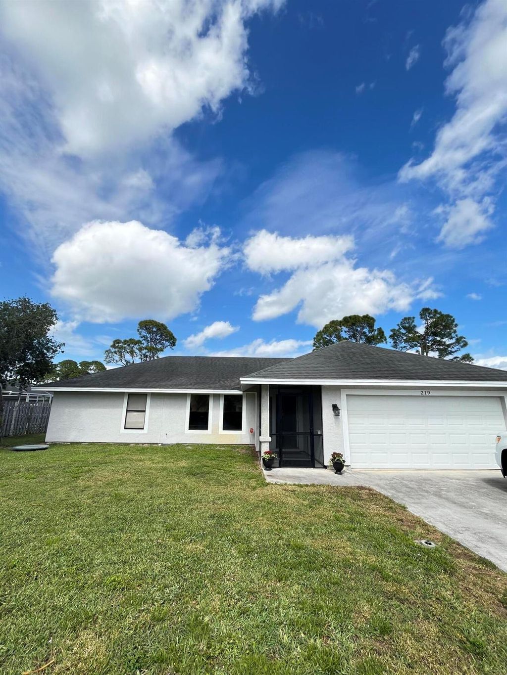 Photo of 219 SW Langfield Avenue, Port Saint Lucie, FL 34984 (MLS # R11068150)