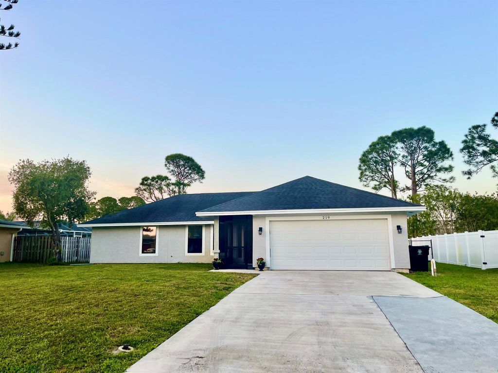 Photo of 219 SW Langfield Avenue, Port Saint Lucie, FL 34984 (MLS # R11068150)