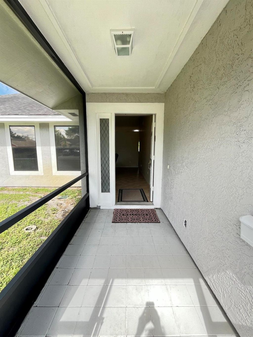 Photo of 219 SW Langfield Avenue, Port Saint Lucie, FL 34984 (MLS # R11068150)