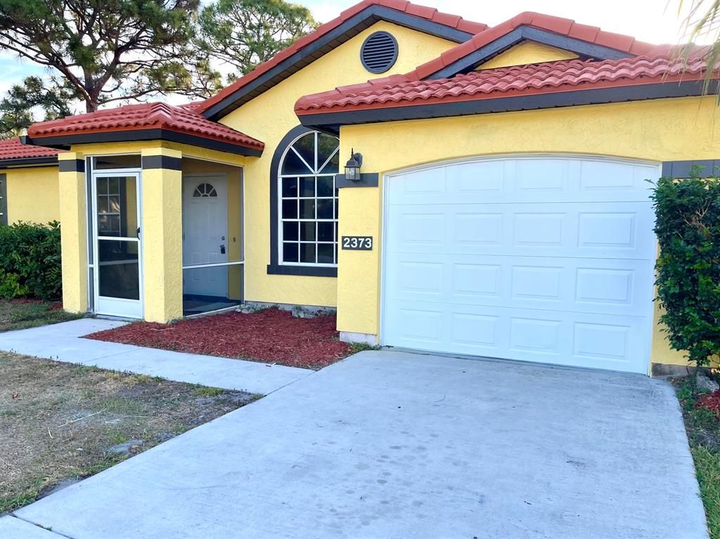 Photo of 2373 SE Marseille Street, Port Saint Lucie, FL 34952 (MLS # R10704960)