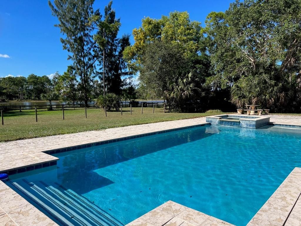 Photo of 5775 Reynolds Road, Lake Worth, FL 33449 (MLS # R11155849)