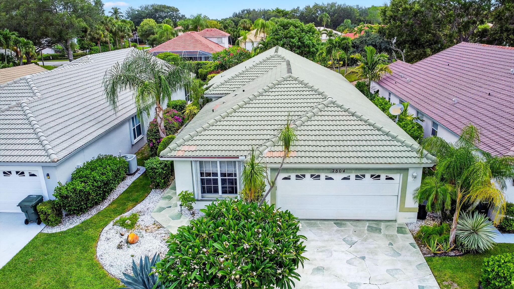 Welcome to a 3-bedroom home nestled by the lake, featuring a private fenced pool. The highlight of this home is the open floor plan. Upon entry, you'll be captivated by the soaring Cathedral Ceilings and tiled and laminate floors throughout. The spacious kitchen boasts granite countertops and stainless steel appliances, installed together with a 2018 A/C unit. The master bedroom is generously sized with two walk-in closets. The living room opens to a screened porch. Outside, a private pool overlooks the lake, with plenty of space for grilling, making it the perfect outdoor living area. The exterior is equipped with hurricane accordion shutters, ensuring peace of mind during storms. Located in the gated, resort-style community of River Bridge with great amenities