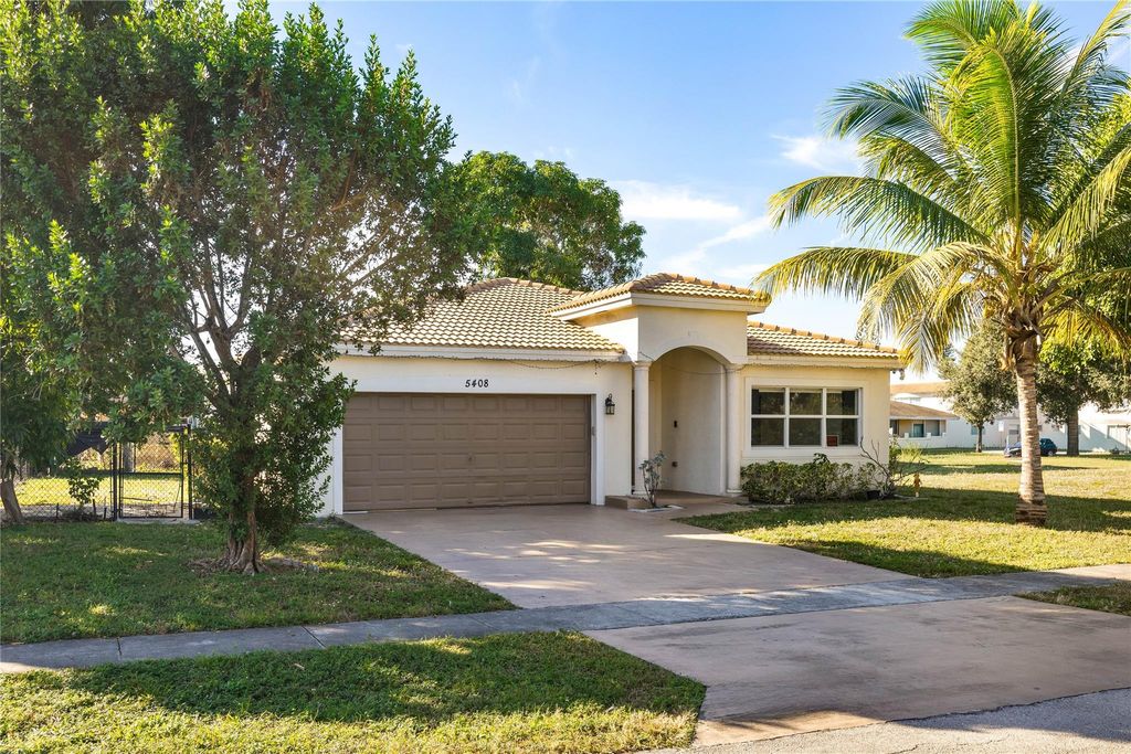 Photo of 5408 NW 18th Pl, Lauderhill, FL 33313 (MLS # F10538454)