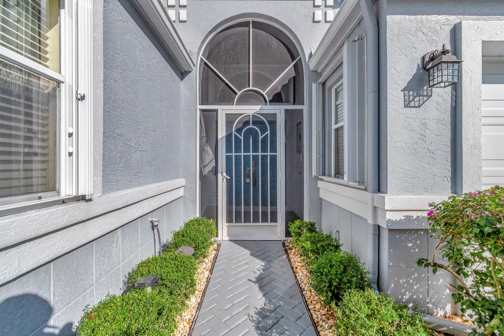 Photo of 10847 Crystal Key Lane, Boynton Beach, FL 33437 (MLS # R10941229)