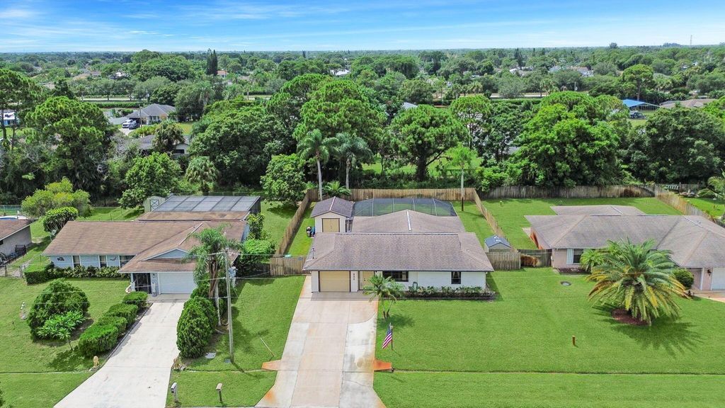 Photo of 232 SE Ray Avenue, Port Saint Lucie, FL 34983 (MLS # R11015533)