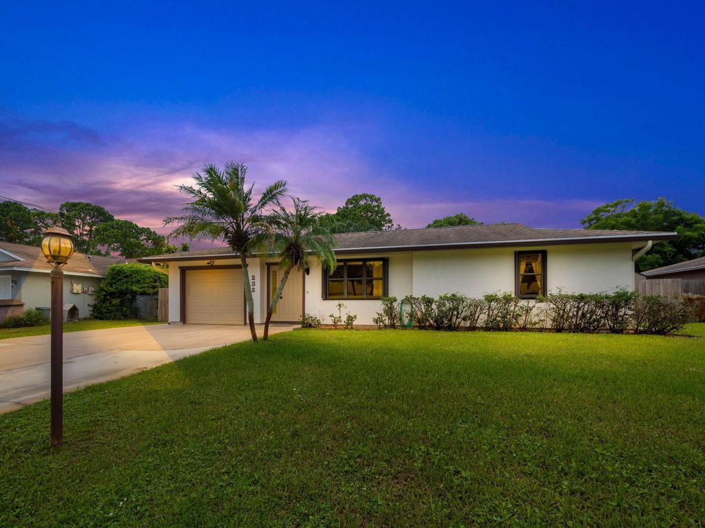 Photo of 232 SE Ray Avenue, Port Saint Lucie, FL 34983 (MLS # R11015533)