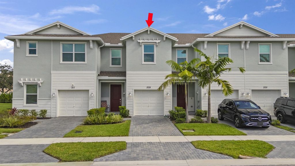Photo of 209 SE Woodbark Street, Port Saint Lucie, FL 34984 (MLS # R11104734)