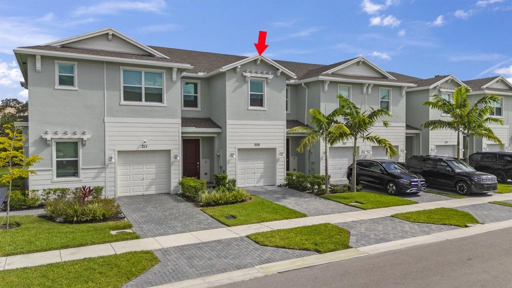 Photo of 209 SE Woodbark Street, Port Saint Lucie, FL 34984 (MLS # R11104734)