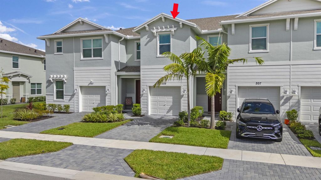 Photo of 209 SE Woodbark Street, Port Saint Lucie, FL 34984 (MLS # R11104734)