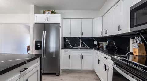Tiny photo for 542 NW 47th Avenue, Plantation, FL 33317 (MLS # B26049566)