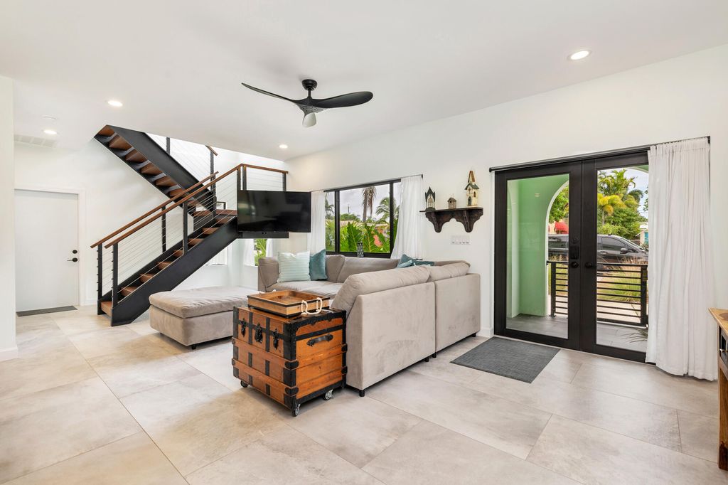 Photo of 127 Auburn Drive, Lake Worth Beach, FL 33460 (MLS # B26049243)