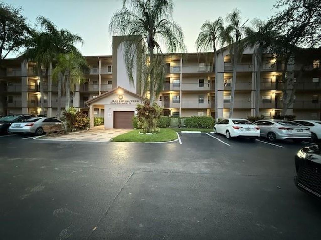 Photo of 1200 SW 124th Terrace #405, Pembroke Pines, FL 33027 (MLS # F10530426)