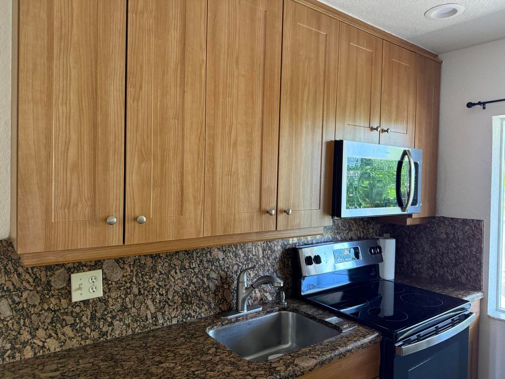Photo of 1423 Holly Heights Drive #13, Fort Lauderdale, FL 33304 (MLS # B26026142)