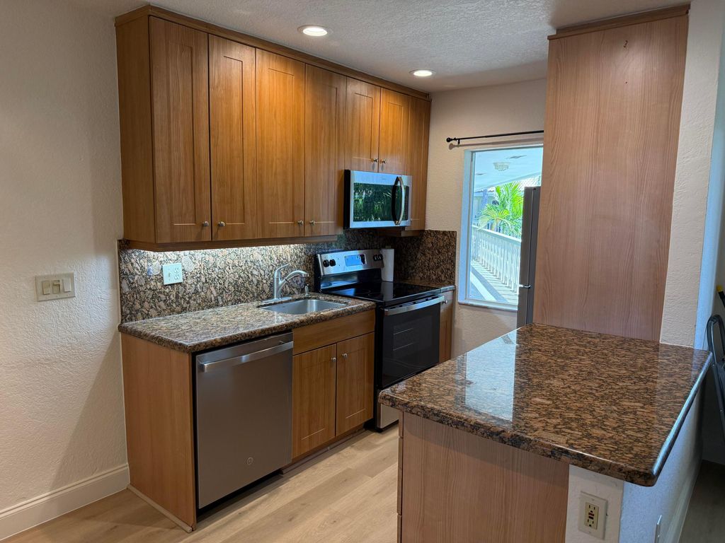 Photo of 1423 Holly Heights Drive #13, Fort Lauderdale, FL 33304 (MLS # B26026142)