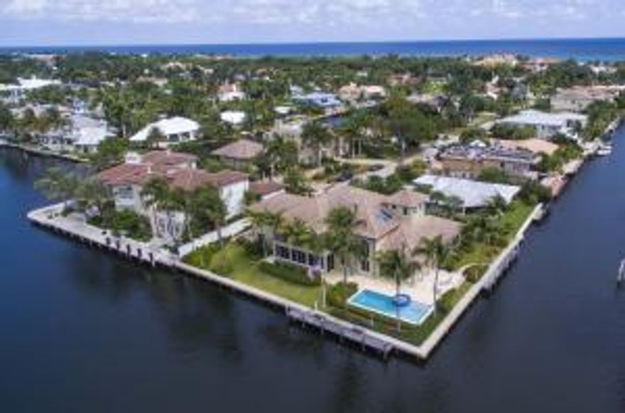 Superb Intracoastal point lot home with idyllic location & boasting 266' deep water. A Yachtsman's dream situated in no-wake zone with two docks, each can accommodate 100'boat. This home was designed with optimal water views plus 3rd. floor Cupola room for Sunset enjoyment. Spiral staircase & Intracoastal view graces grand entry. 6 en-suite bedrooms(master & 2nd. Bedroom Downstairs),6 baths & 2 half-baths. 6864 a/c sq.ft., 8676 total, 3 car garage. Elevator, Heated pool, Impact glass, Marble flooring, Lg. balcony viewing ICWW,Sound system & the ultimate entertaining areas includes; over sized & beautifully equipped kitchen, family room and sun-room flowing into spacious loggia & patios surrounding pool,docks & Intracoastal boating activity.5 zones a/c.Easy access to Delrays beautiful beach