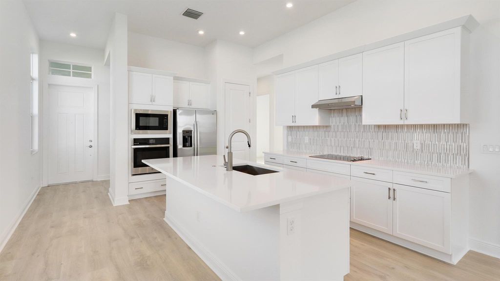 Photo of 161 SE Via Sangro, Port Saint Lucie, FL 34952 (MLS # R10943024)
