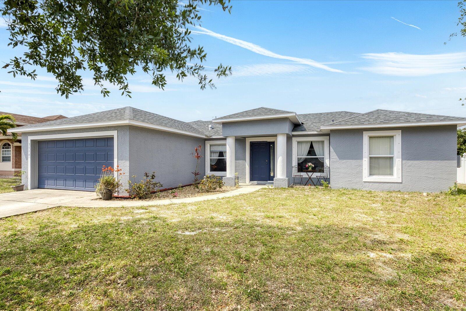 Beautiful Single Family Home located in the heart of Port Saint Lucie. This charming 3-bedrooms and 2-bathrooms residence features a modern open kitchen with countertops include refrigerator, range, microwave and dishwasher. Amazing bamboo flooring throughout the unit. The spacious master bedroom includes a walk-in closet, additional storage closet, and the bathroom features a tub/shower combo. The bright and airy living area complements the home's inviting atmosphere. Centrally located, it offers easy access to supermarkets, highways, shopping centers, restaurants and more.