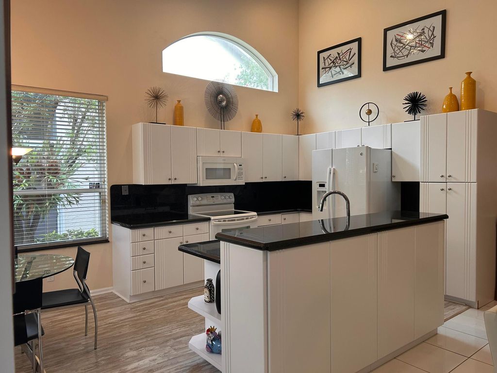Photo of 8884 Shoal Creek Lane, Boynton Beach, FL 33472 (MLS # B26042501)