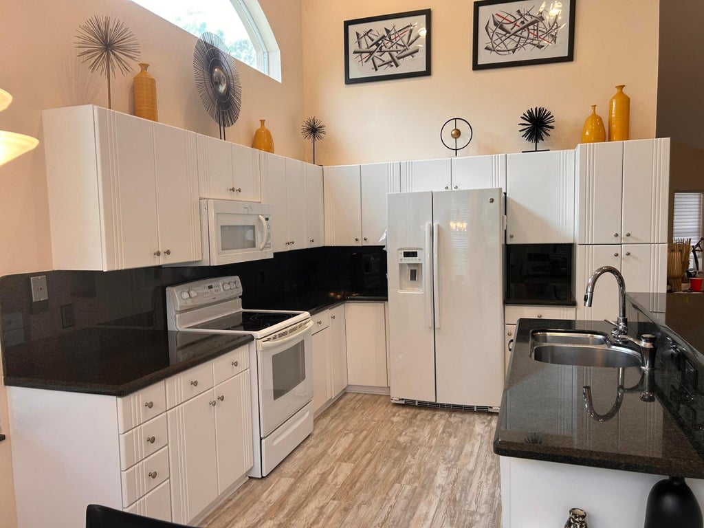Photo of 8884 Shoal Creek Lane, Boynton Beach, FL 33472 (MLS # B26042501)