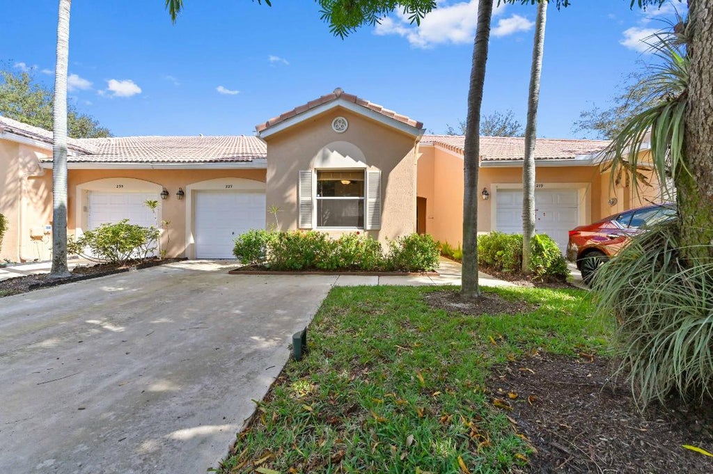 Photo of 227 Coral Trace Lane, Delray Beach, FL 33445 (MLS # R11059941)