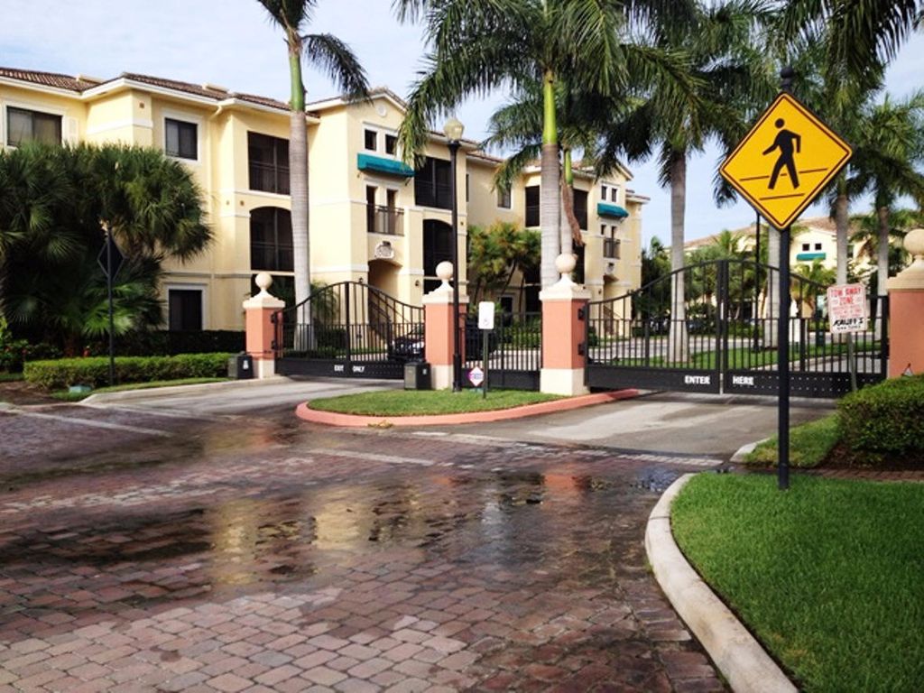 Photo of 3019 Alcazar Place #Apt 102, Palm Beach Gardens, FL 33410 (MLS # B26020645)