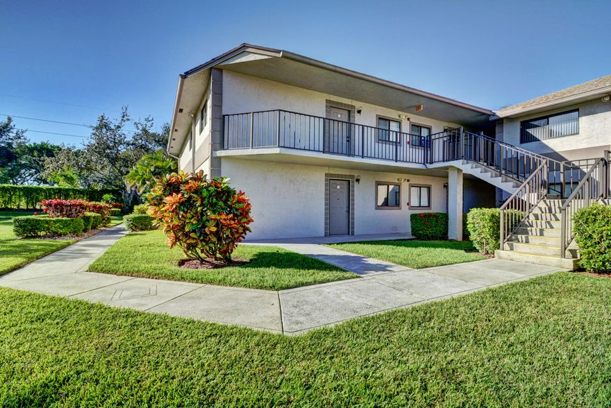 WOW !THIS GROUND FLOOR CORNER UNIT IS STUNNING ONE OF A KIND WITH GARDEN AREAS ALL AROUND AND AN AMZAZING VIEW OF THE LAKE NO EXPENSE  HAS BEEN SPARED IN THIS CONDO EVERYTHING IS BRAND NEW INCLUDING THE AC UNIT AND WATER TANK 
AS YOU WALK IN ALL NEW PORCELAIN FLOORS PLENTY OF LIGHT WITH SPOT LIGHTS THROUGHOUT THE ENTIRE CONDO
 A LARGE OPEN SPACE KITCHEN WITH A GORGEOUS GRANITE COUNTERTOP AND BACKSPLASH ALL NEW STAINLESS STEEL APPLIANCES WITH A DOUBLE DOOR FRIDGE THE DINING ROOM HAS A GORGEOUS CHANDELIER AND THE MASTER BEDROOM HAS A HIS AND HERS SINK ALL WITH GRANITE COUNTERTOPS THE SECOND BATHROOM ALSO HAS A GORGEOUS FRAIMLESS SHOWER  AND VANITY WITH GRANITE COUNTERTOPS THERE IS A SEPERATE WASHER AND DRYER ROOM WITH PLENTY OF STORAGE SPACE THROUGOUT THE CONDO A MUST SEE !WONT LAST