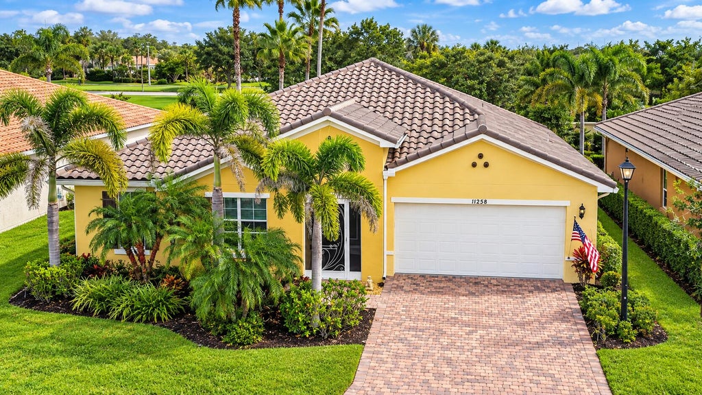 Photo of 11258 SW Apple Blossom Trail, Port Saint Lucie, FL 34987 (MLS # B26078338)