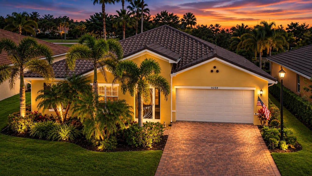 Photo of 11258 SW Apple Blossom Trail, Port Saint Lucie, FL 34987 (MLS # B26078338)