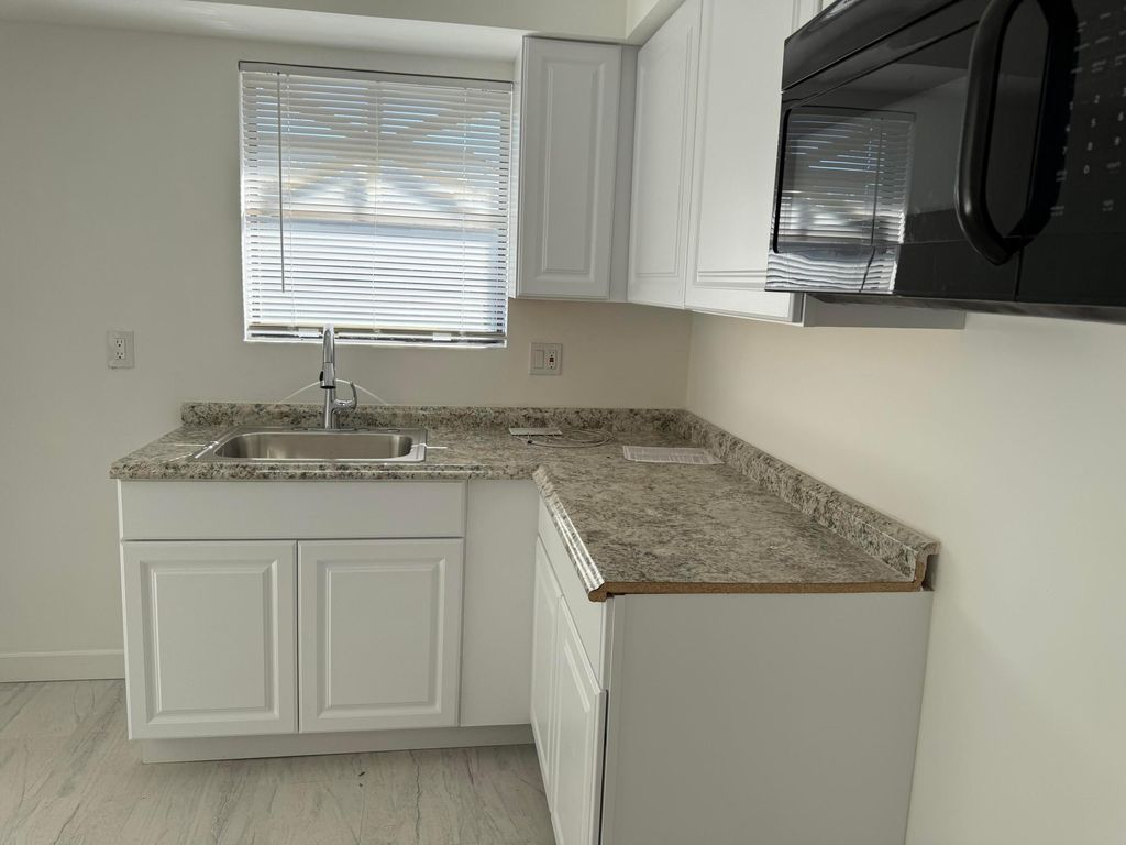 Photo of 2103 Wharf Lane, Greenacres, FL 33463 (MLS # R11150678)