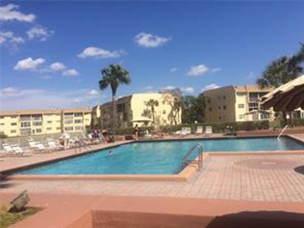 Photo of 8465 Sunrise Lakes Boulevard #106, Sunrise, FL 33322 (MLS # B26002086)