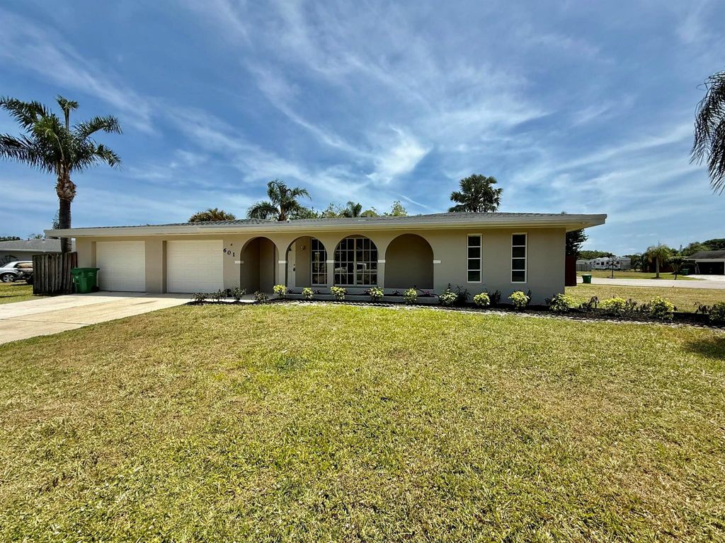 Photo of 601 SW Ivanhoe Drive, Port Saint Lucie, FL 34983 (MLS # R11086486)