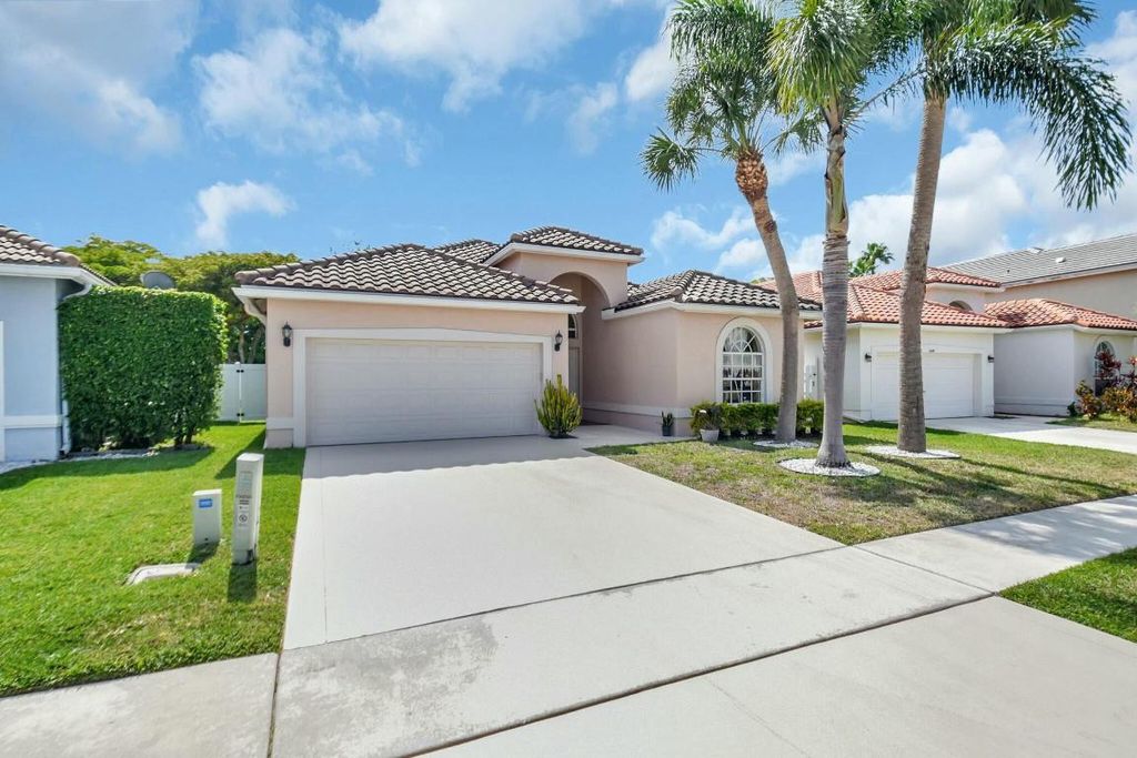 Photo of 6090 Newport Village Way, Lake Worth, FL 33463 (MLS # R11082044)