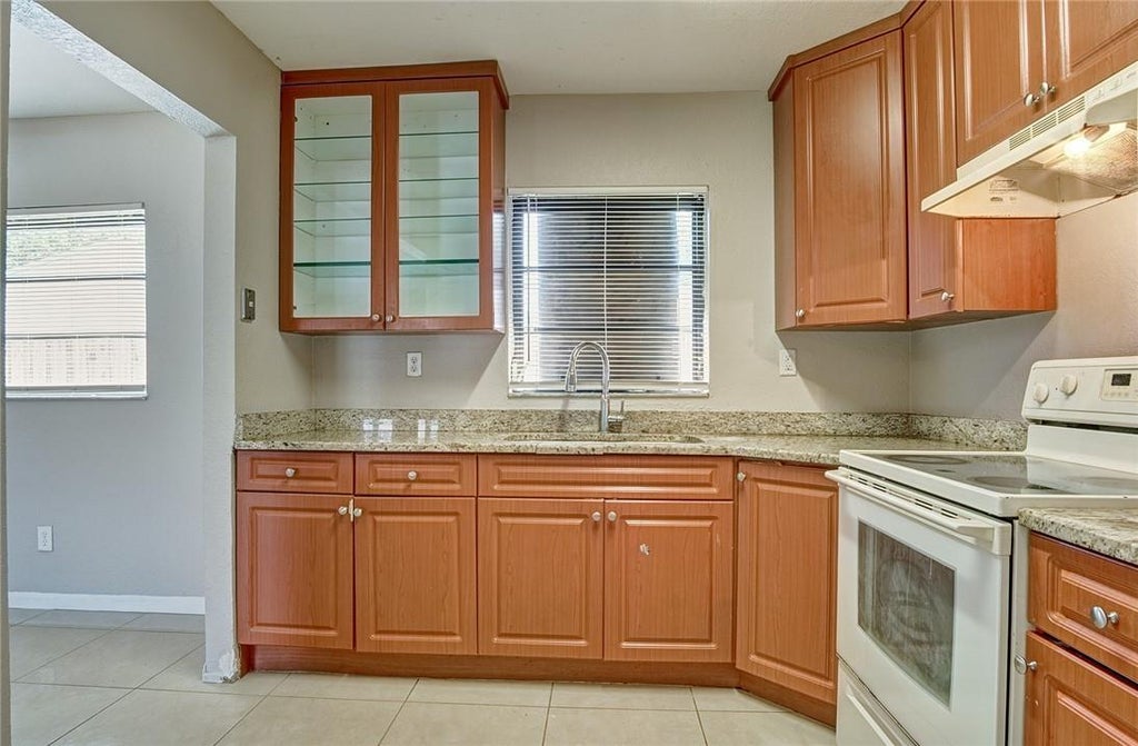 Photo of 225 NW 7th Court, Deerfield Beach, FL 33441 (MLS # F10446066)