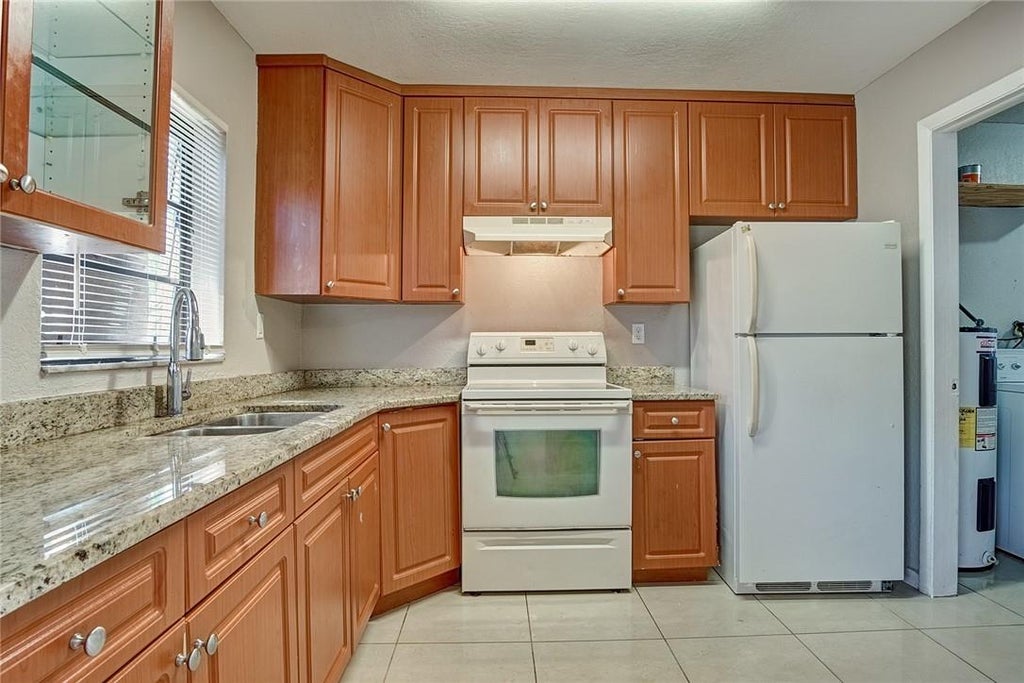 Photo of 225 NW 7th Court, Deerfield Beach, FL 33441 (MLS # F10446066)