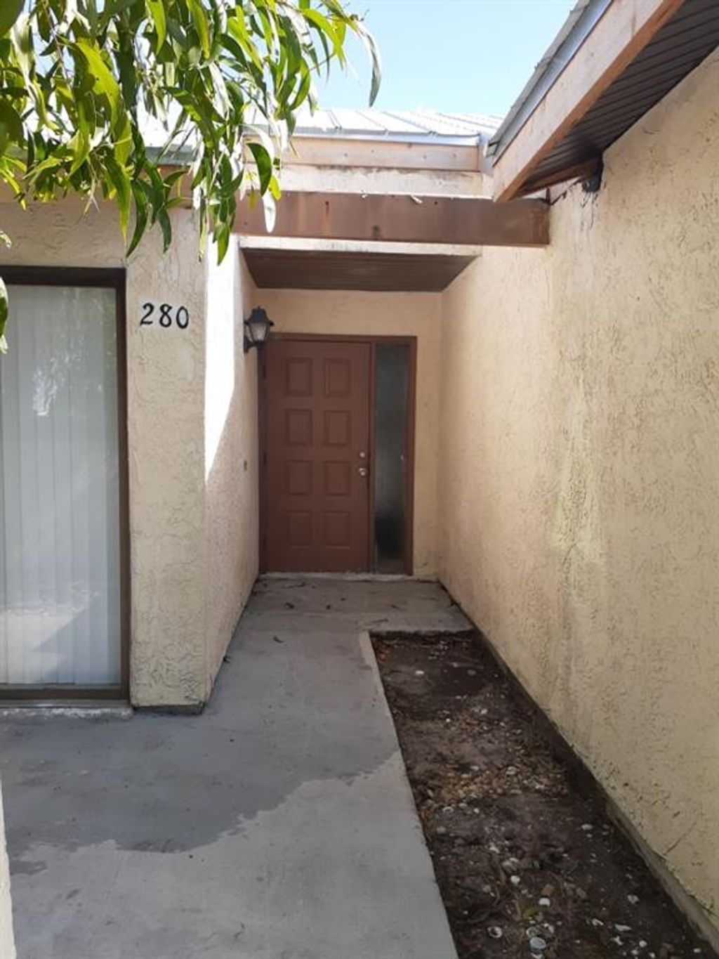 Photo of 280 SW Sterret Cir, Port Saint Lucie, FL 34953 (MLS # F10275031)