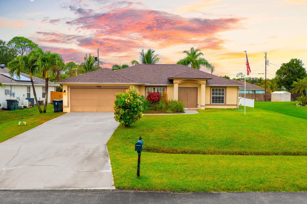 Photo of 1968 SW Hillman Street, Port Saint Lucie, FL 34953 (MLS # R10937200)