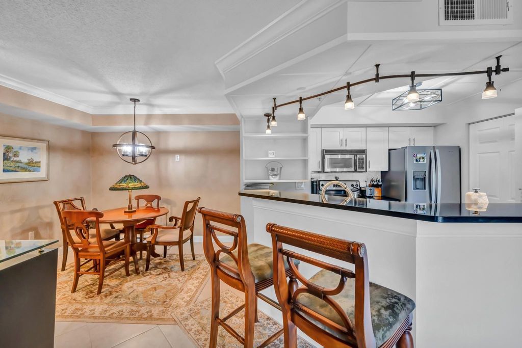 Photo of 3798 NW Adriatic Lane #106, Jensen Beach, FL 34957 (MLS # F10435518)