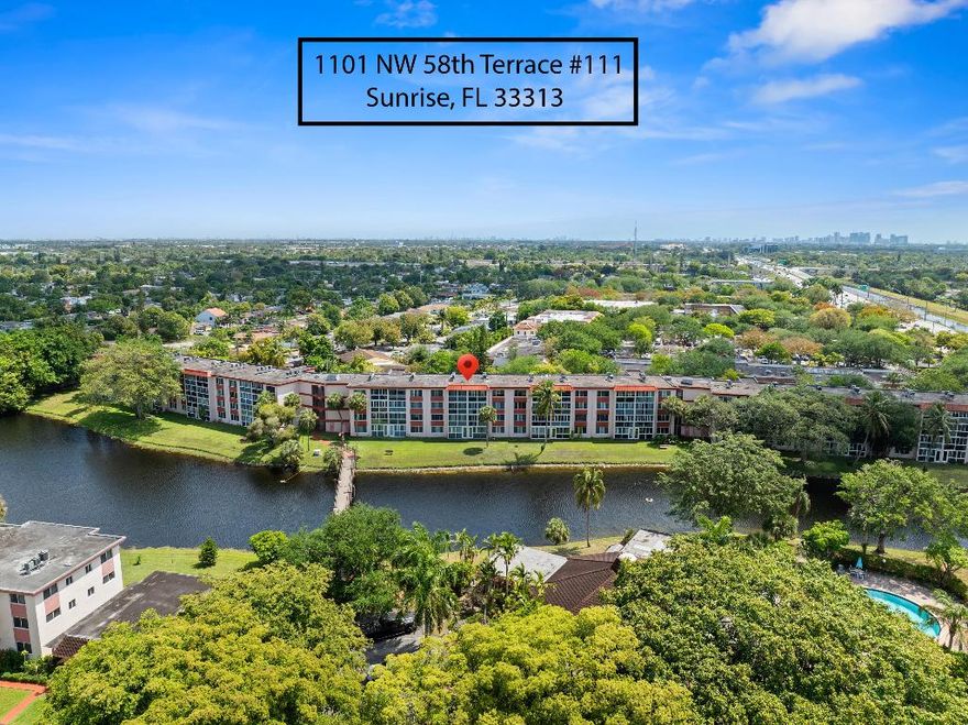 Welcome to your peaceful retreat in one of the most desired locations-just minutes from the Turnpike. This charming ground floor 2 bedroom, 2 bathroom unit offers convenient first floor living with no stairs or elevator needed, perfect for comfort and ease. Step into serenity, as you enter you're greeted by large windows that flood the space with natural light and offer a beautiful calming water view. This unit is bright and spacious, has tile floor throughout and ample storage space. Residents enjoy access to fantastic amenities including a community pool, clubhouse and tennis courts. The excellent neighbors and friendly community make it feel like home from day one. Schedule your private tour today and fall in love with the view, the location and the lifestyle this 55+ community offers.