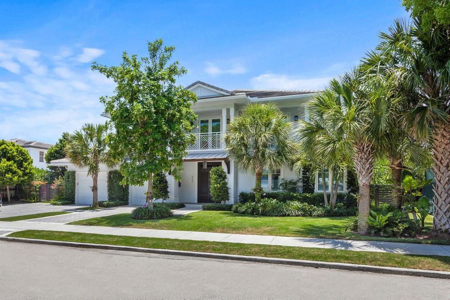 This charming newer-construction custom estate, located in the chic SoSo (South of Southern) neighborhood in West Palm Beach, features an open-floor-plan split-bedroom layout featuring high quality materials and exhibiting superior workmanship. Features include a two-story great room, chef's kitchen, first-floor primary suite, detached guesthouse/cabana, and an intimate hedged outdoor pool area.