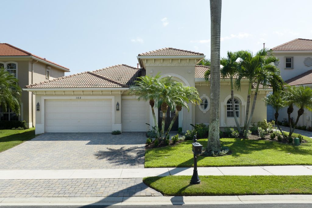 Photo of 102 Abondance Drive, Palm Beach Gardens, FL 33410 (MLS # R10918644)