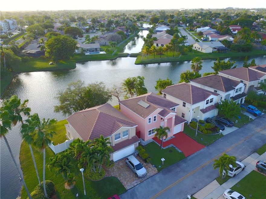 Beautiful, serene Lake Views & tucked in the back of the community featuring 3 bedrooms 2.5 baths located in a GATED COMMUNITY in Cypress Cove. LOW HOA $150. per YEAR! Updated Kitchen with Granite counters. Formal Living & dining room with separate family room off kitchen. Tiled floors downs stairs and carpeting upstairs. Spacious master bedroom with walk-in closet. Master bathroom with dual sinks and large tub/shower combination. Jack & Jill bathroom for other two bedrooms. Fenced yard. AC 2010 & solar water heater. Centrally located close to good schools, shopping & main roads.