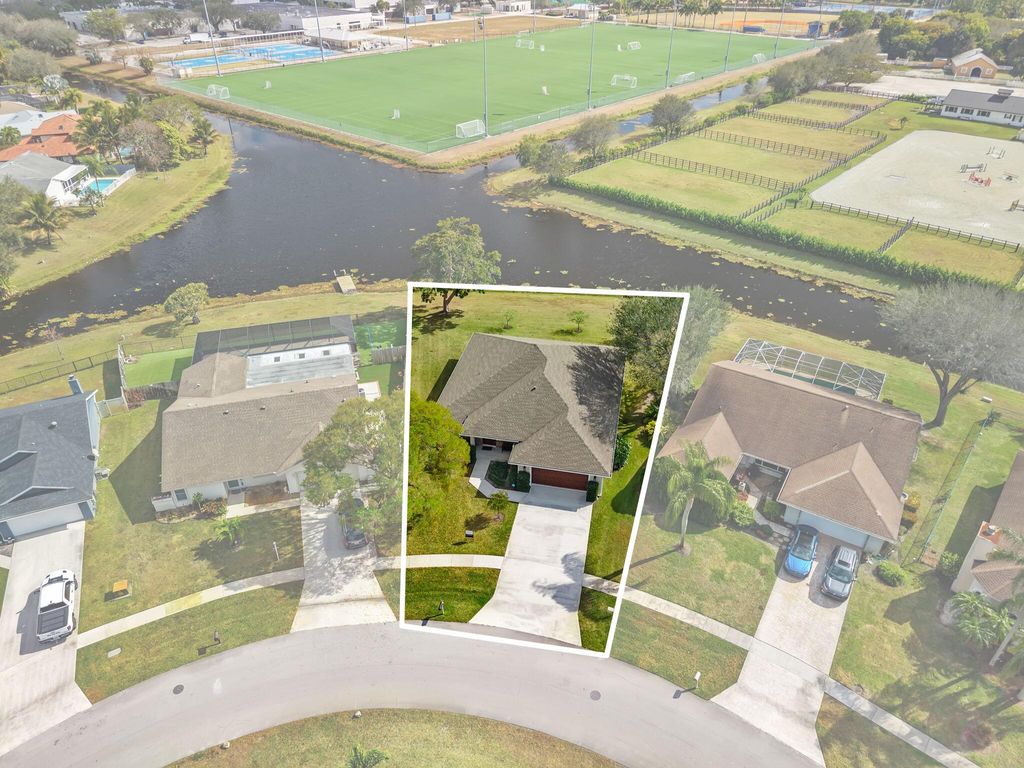 Photo of 1901 Primrose Lane, Wellington, FL 33414 (MLS # R11161301)