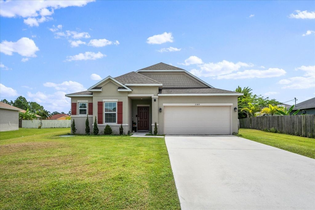Photo of 2389 SW Vale Street, Port Saint Lucie, FL 34953 (MLS # R10997742)