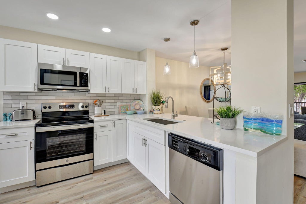 Photo of 29 Stratford Lane #F, Boynton Beach, FL 33436 (MLS # R11044442)
