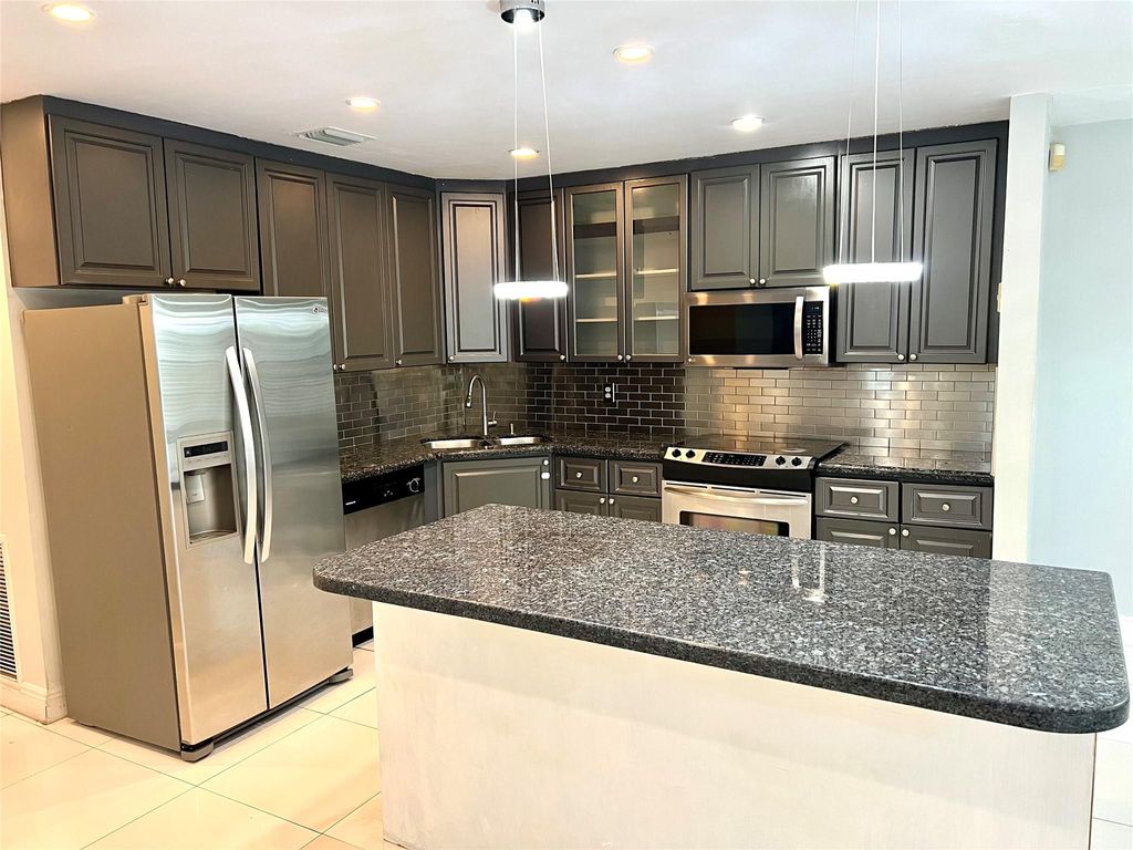 Photo of 4989 Riverside Drive #504, Coral Springs, FL 33067 (MLS # F10478690)