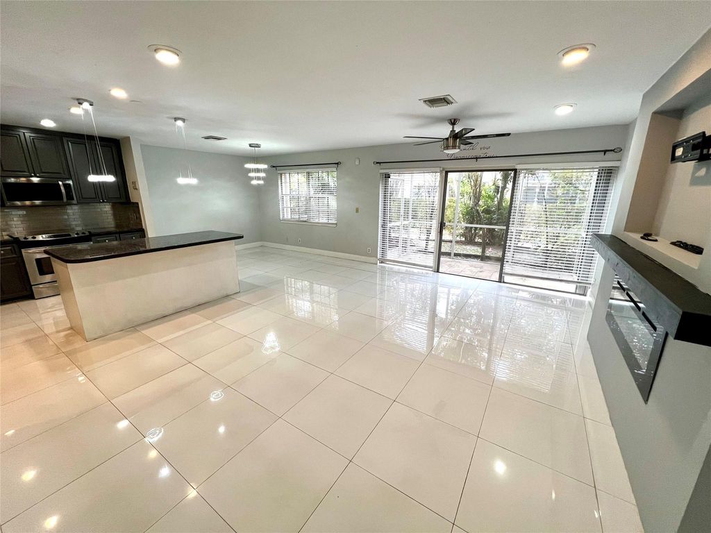 Photo of 4989 Riverside Drive #504, Coral Springs, FL 33067 (MLS # F10478690)